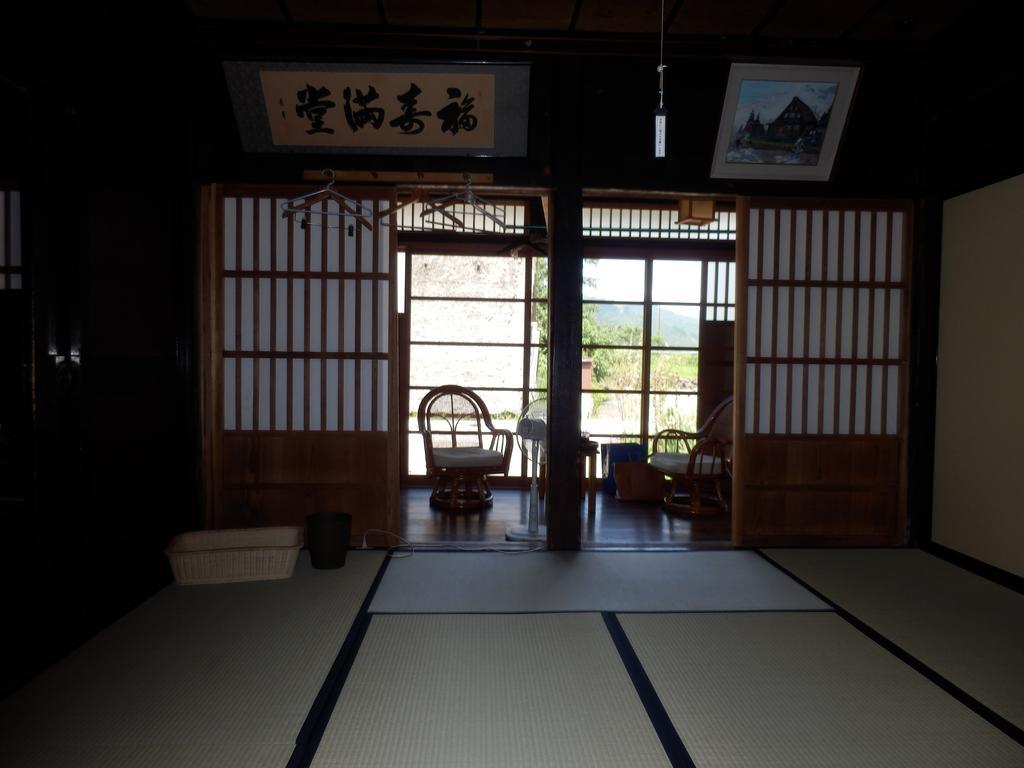 Hotel Minshuku Yomoshirou Nanto Zimmer foto